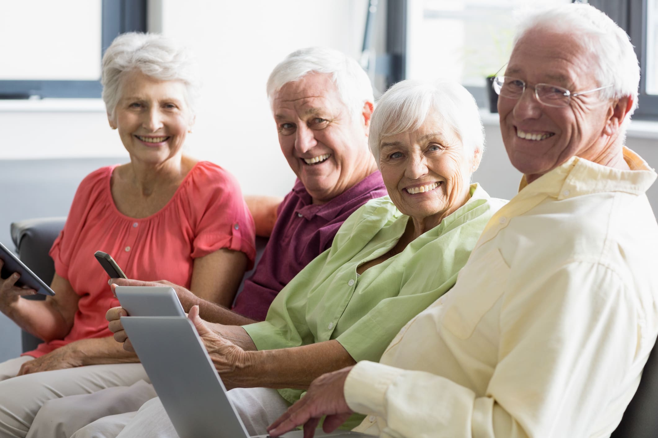 Older adults using tablets together
